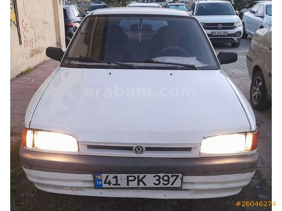 MAZDA 323 OTOMATİK-1.6-16 V.1992 MODEL.