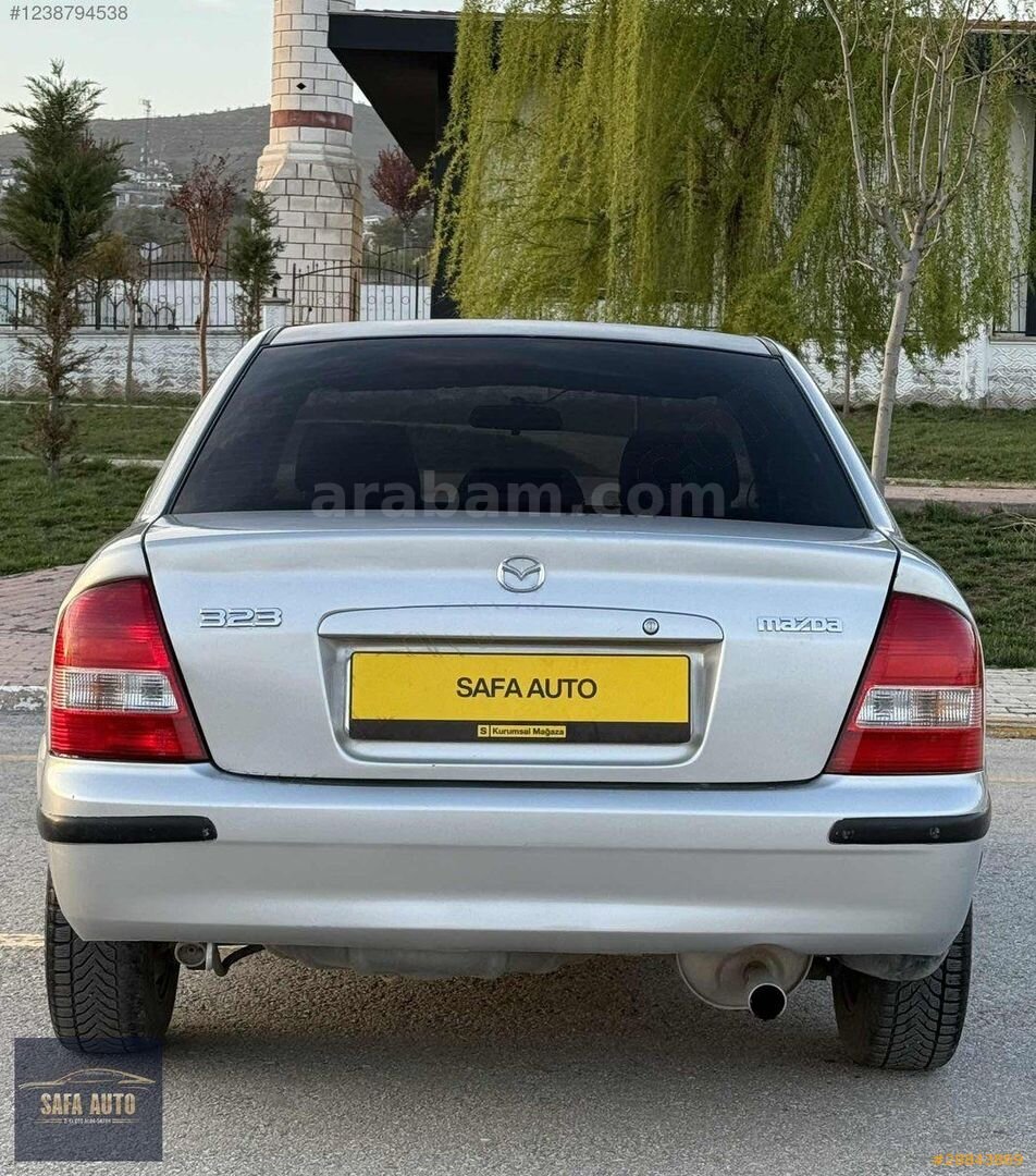 Galeriden Mazda 323 1.8 Familia 1999 Model Elazığ 430.000 km Gri 7