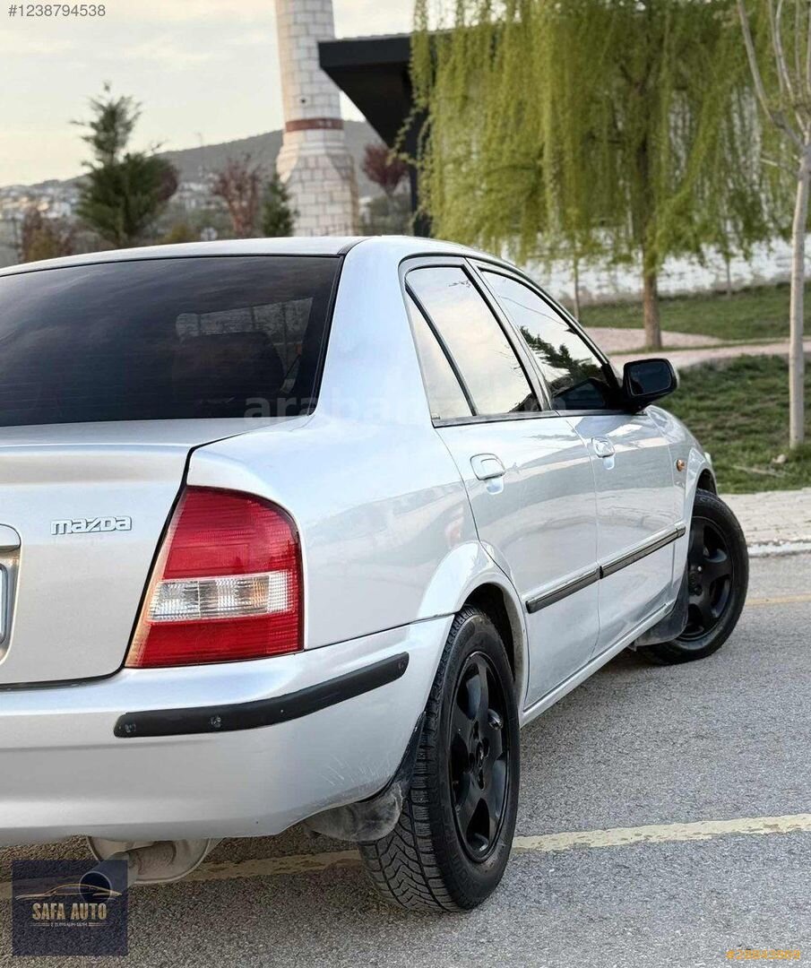 Galeriden Mazda 323 1.8 Familia 1999 Model Elazığ 430.000 km Gri 3