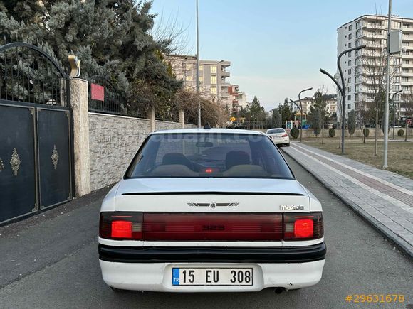Sahibinden Mazda 323 1.6 GLX Klimalı 1992    Model 