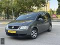 KEÇECİOĞULLARI GRUP'DAN 2004 TOURAN 1.6 185.000 KM 7 KİŞİLİK