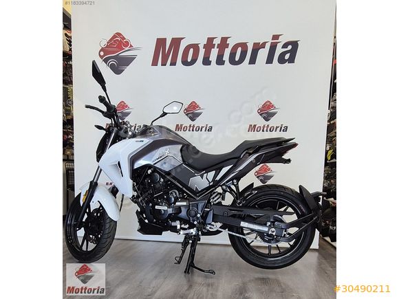 İZMİR SYM NHX125