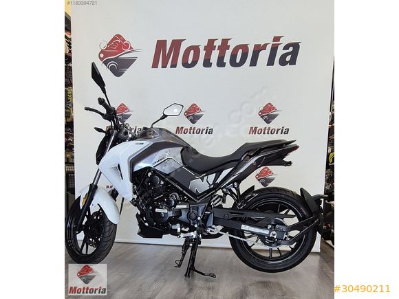 İZMİR SYM NHX125