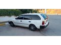 fabrikasyon KLİMALI 1.3 corolla temiz kullanılmış aile aracıdır