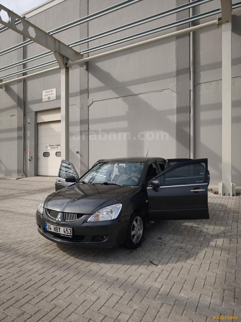 Sahibinden Mitsubishi Lancer 1.6 Comfort 2004 Model Adana 296.500 km Füme 1