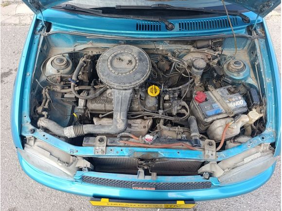 ÇOK TEMİZ MAZDA 121..