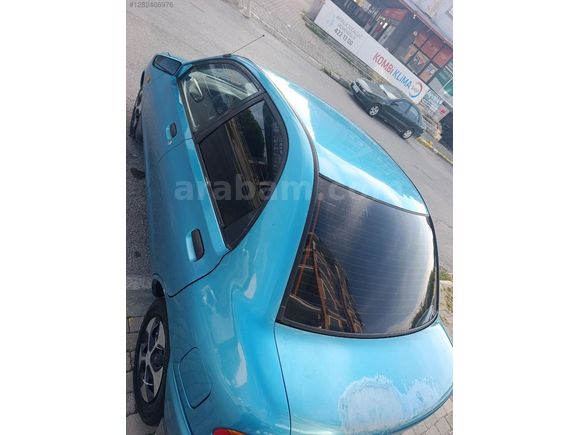 ÇOK TEMİZ MAZDA 121..