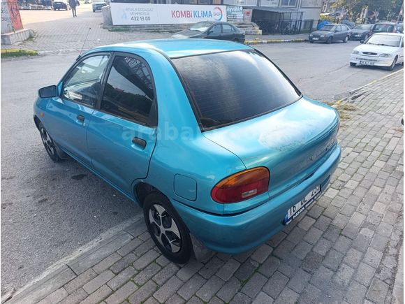 ÇOK TEMİZ MAZDA 121..