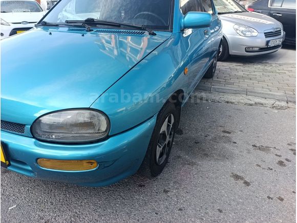 ÇOK TEMİZ MAZDA 121..