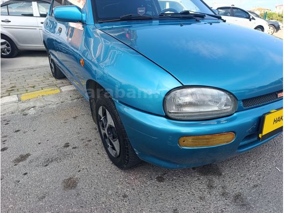 ÇOK TEMİZ MAZDA 121..