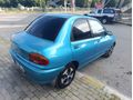 ÇOK TEMİZ MAZDA 121..
