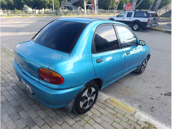 ÇOK TEMİZ MAZDA 121..