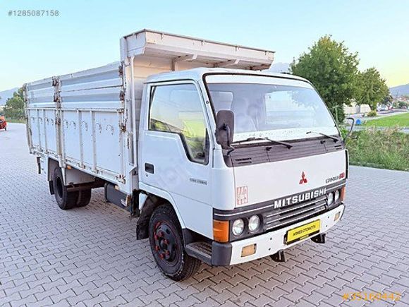 EMSALSİZ KM HATASIZ BOYASIZ AHŞAP KASALI MİTSUBİSHİ FE 449
