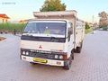 EMSALSİZ KM HATASIZ BOYASIZ AHŞAP KASALI MİTSUBİSHİ FE 449
