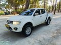 2015 MİTSUBİSHİ L200 ÇİFT KABİN 4x2 160 BİN KMDE MASRAFSIZ TEMİZ