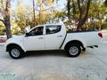 2015 MİTSUBİSHİ L200 ÇİFT KABİN 4x2 160 BİN KMDE MASRAFSIZ TEMİZ