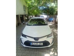 Sahibinden Toyota Corolla 1.8 Hybrid Flame 2021 Model  84.000 km Beyaz