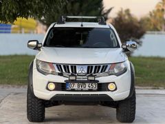 Sahibinden Mitsubishi L 200 4x4 Storm 2016 Model  227.000 km Beyaz Ofrooad /Carplay