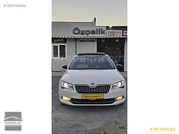 CAM TAVAN BEJ TAM DERİ DÖŞEME PRESTIGE 145.000 KM'DE BEYAZ