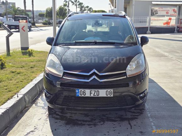 öğretmenden cam tavanlı 7kişilik dizel otomatik aile arabası