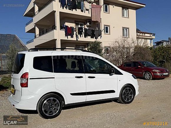 UÇAR'DAN...HATASIZ BOYASIZ TRAMERSİZ 2023 TİTANİUM PLUS COURİER