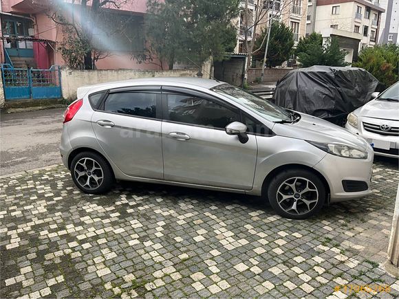 2014 çıkışlı Ford Fiesta 1.5TDCI boyasız hatasız hasar kayıtsız 