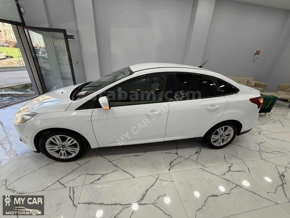 MY CAR MOTORS'TAN FORD FOCUS