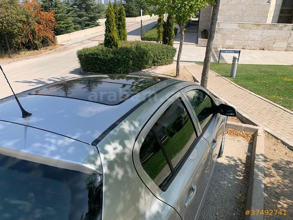 Kamu çalışanından temiz, bakımlı ve sunroof'lu Astra 1.3 dizel