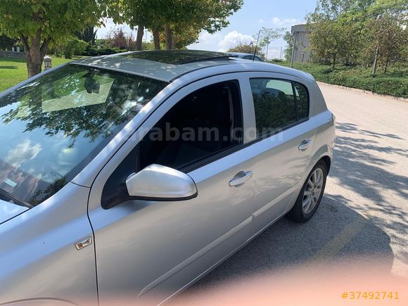 Kamu çalışanından temiz, bakımlı ve sunroof'lu Astra 1.3 dizel