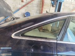 Audi A6 arka kelebek camı