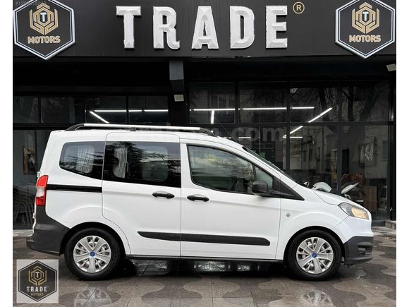 TRADE MOTORS & FORD