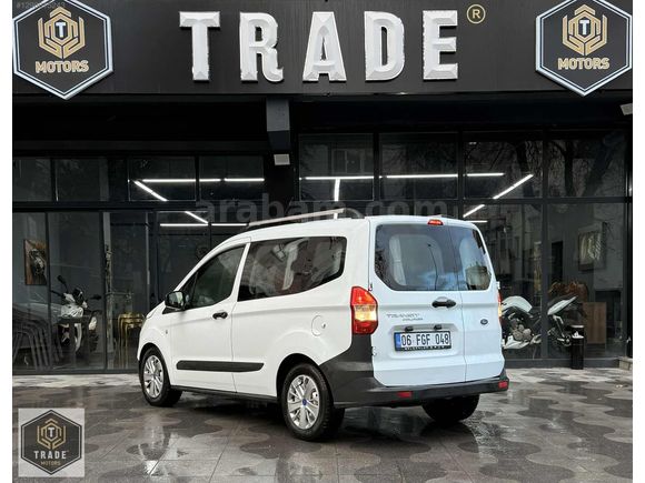 TRADE MOTORS & FORD
