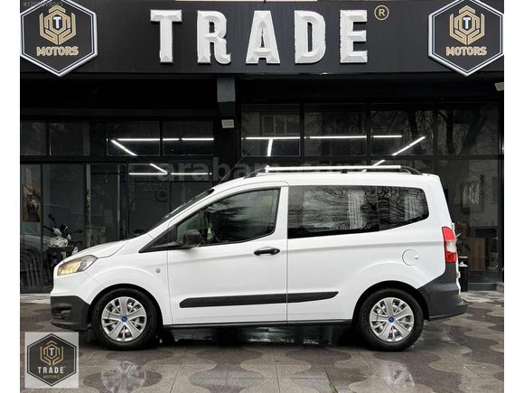 TRADE MOTORS & FORD