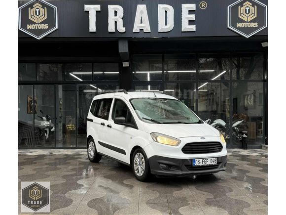 TRADE MOTORS & FORD