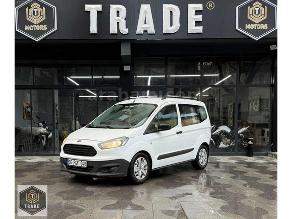 TRADE MOTORS & FORD