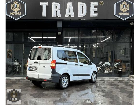 TRADE MOTORS & FORD