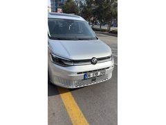 Sahibinden Volkswagen Caddy 2.0 TDI Style 2024 Model ilk sahibinden  tan bonolarda ufaktefek çizikler  