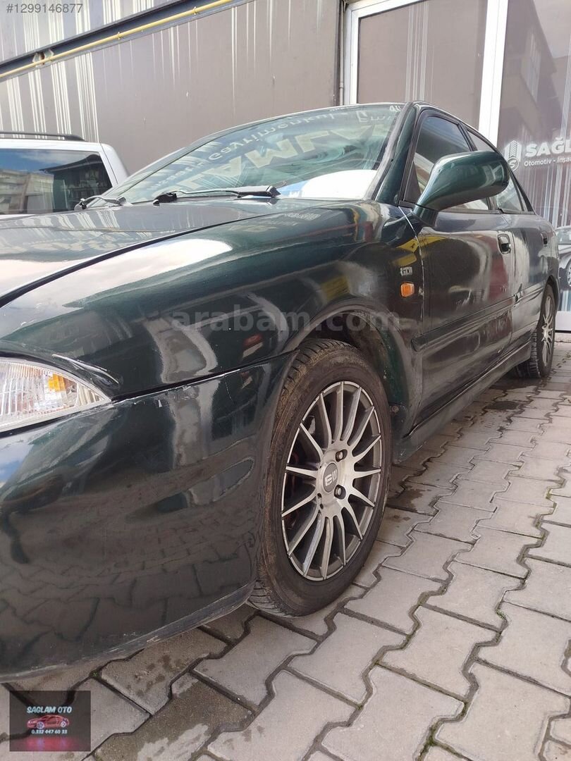 Galeriden Mitsubishi Carisma 1.8 GDI Classic 1999 Model Konya 357.162 km Yeşil 7