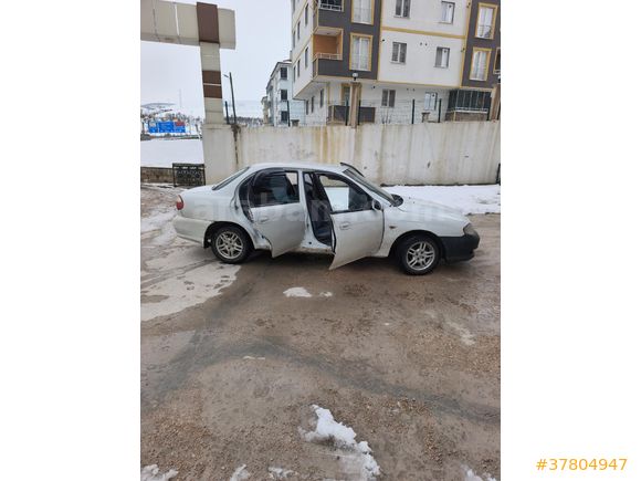Sahibinden Kia Sephia 1.5 LS 2000 Model  koltuklarda TV sistemi  Android multimedya 1.5 doch motor araba yükseltmek için satıyorum