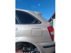 TÜNEYLER 'DEN MAZDA 323 CAM