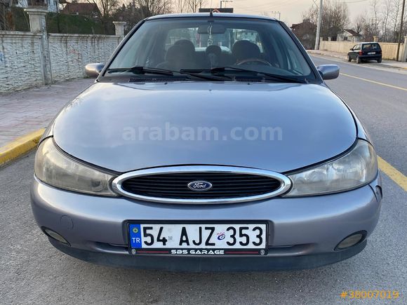 Aracım 1998 model Ford Mondeo’dur. 2.0 motor olup performansı oldukça iyidir. LPG’li olduğu için yakıt konusunda ekonomiktir. Motor ve yürüyen aksamın