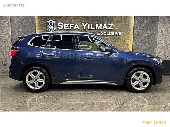 SEFA YILMAZ'DAN 2024 X1 eDRIVE20 XLINE BOYASIZ MOCHA DERI