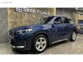 SEFA YILMAZ'DAN 2024 X1 eDRIVE20 XLINE BOYASIZ MOCHA DERI