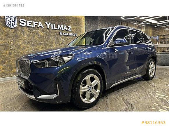 SEFA YILMAZ'DAN 2024 X1 eDRIVE20 XLINE BOYASIZ MOCHA DERI