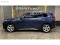 SEFA YILMAZ'DAN 2024 X1 eDRIVE20 XLINE BOYASIZ MOCHA DERI