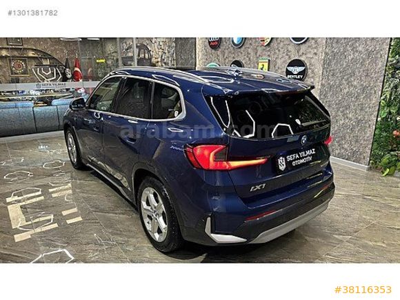 SEFA YILMAZ'DAN 2024 X1 eDRIVE20 XLINE BOYASIZ MOCHA DERI