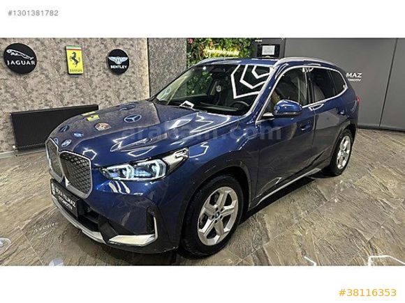 SEFA YILMAZ'DAN 2024 X1 eDRIVE20 XLINE BOYASIZ MOCHA DERI