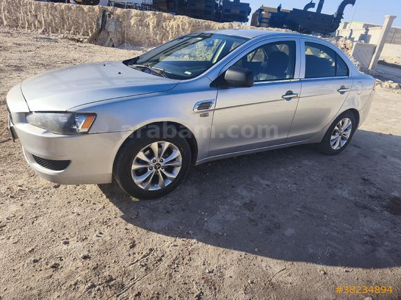 Sahibinden Mitsubishi Lancer 1.5 Inform 2010 Model  306.000 km Gri (Gümüş)
