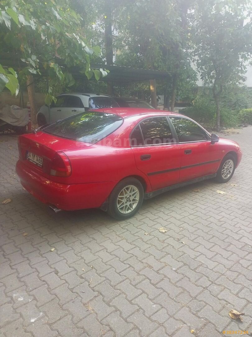 Sahibinden Mitsubishi Carisma 1.6 GLX 1999 Model İstanbul 235.000 km Kırmızı 4