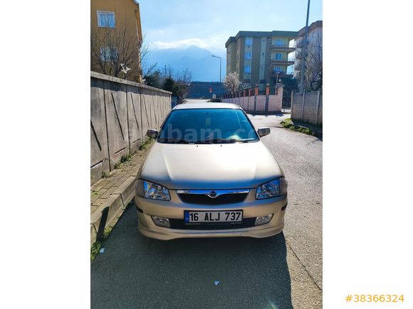 Sahibinden Mazda 323 1.5 1999 Model  396.000 km Şampanya